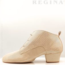 Regina Andinas med guldprickar, sedd från sidan